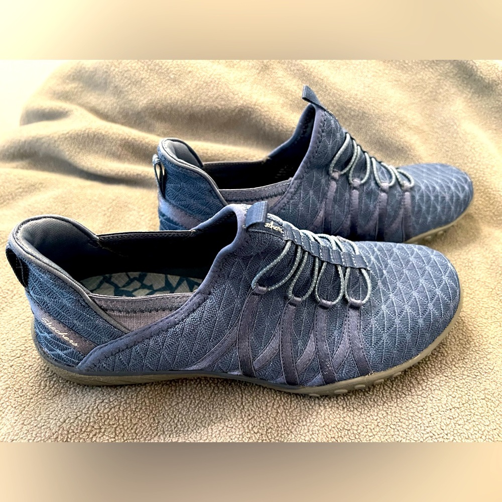 Skechers denim blue slip on sneakers. Never worn.